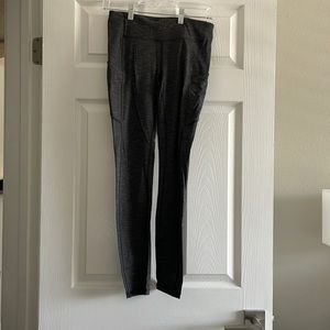Lululemon Size 6 leggings with side pockets.